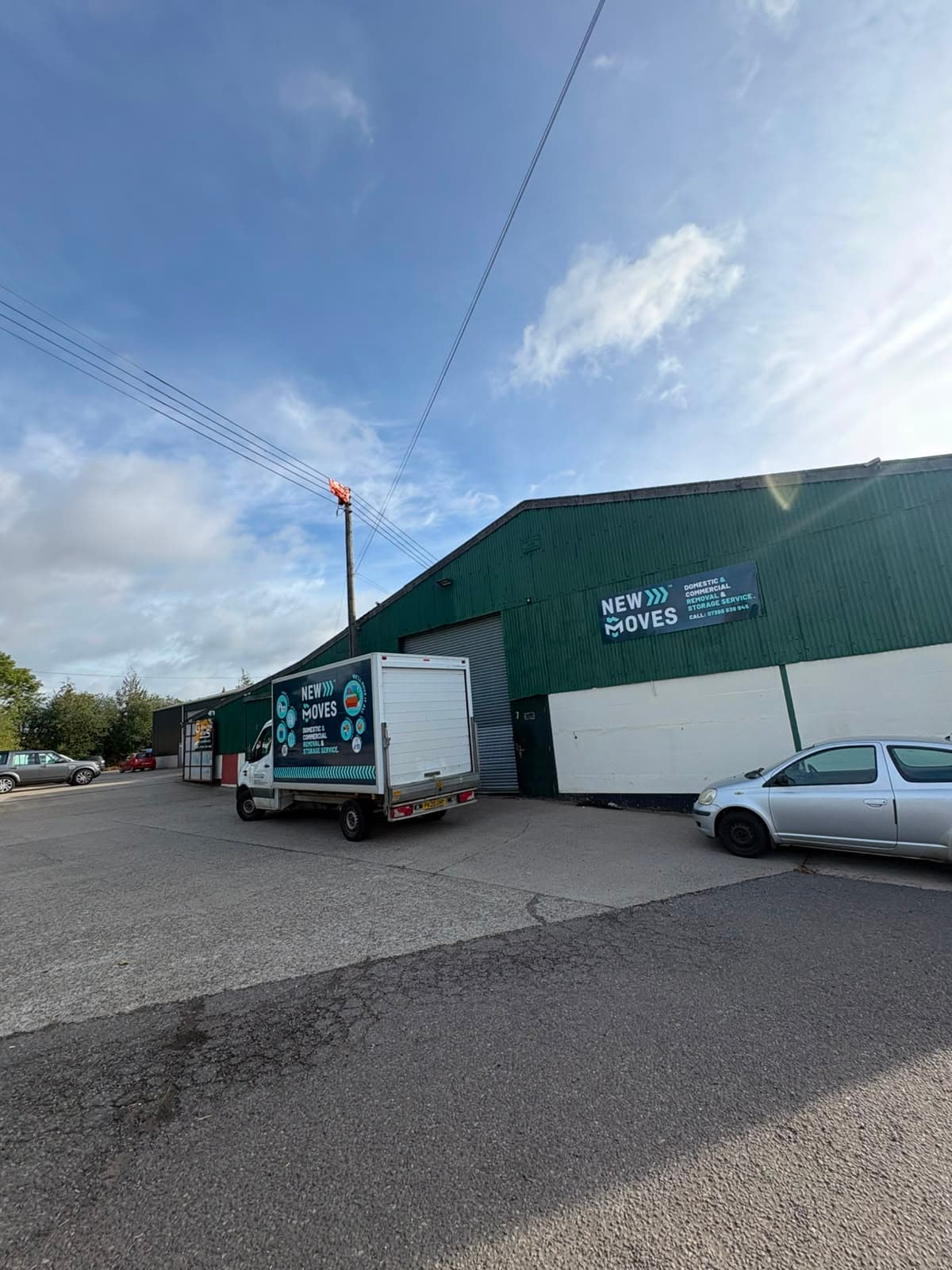 New Moves Removals vans parked at the storage yard