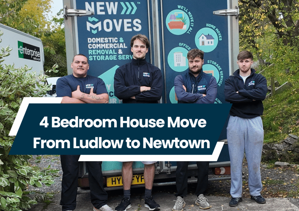 Four New Moves Removals team members standing with arms crossed in front of a branded removal van, with text overlay '4 Bedroom House Move From Ludlow to Newtown'
