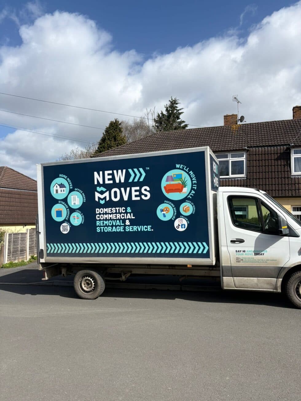 New Moves Removals van parked outside a residential house on a suburban street